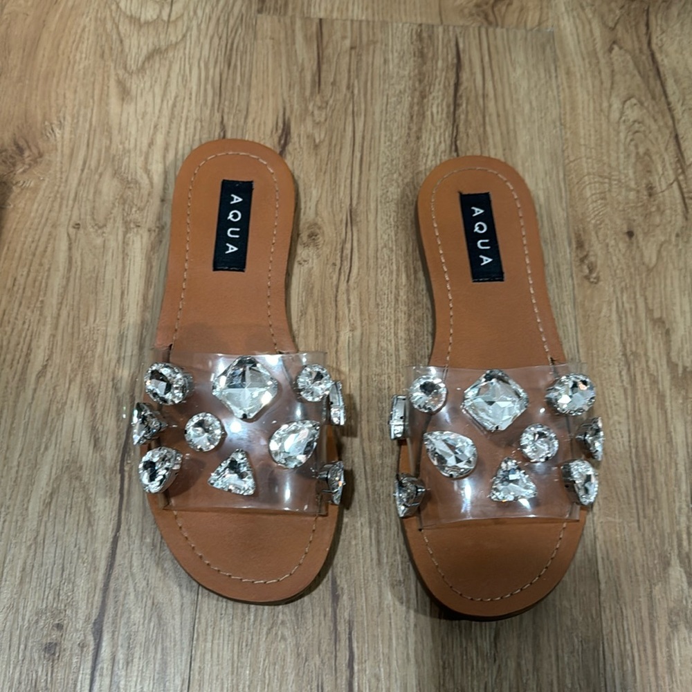 Gently used slide sandal with crystal embellishment